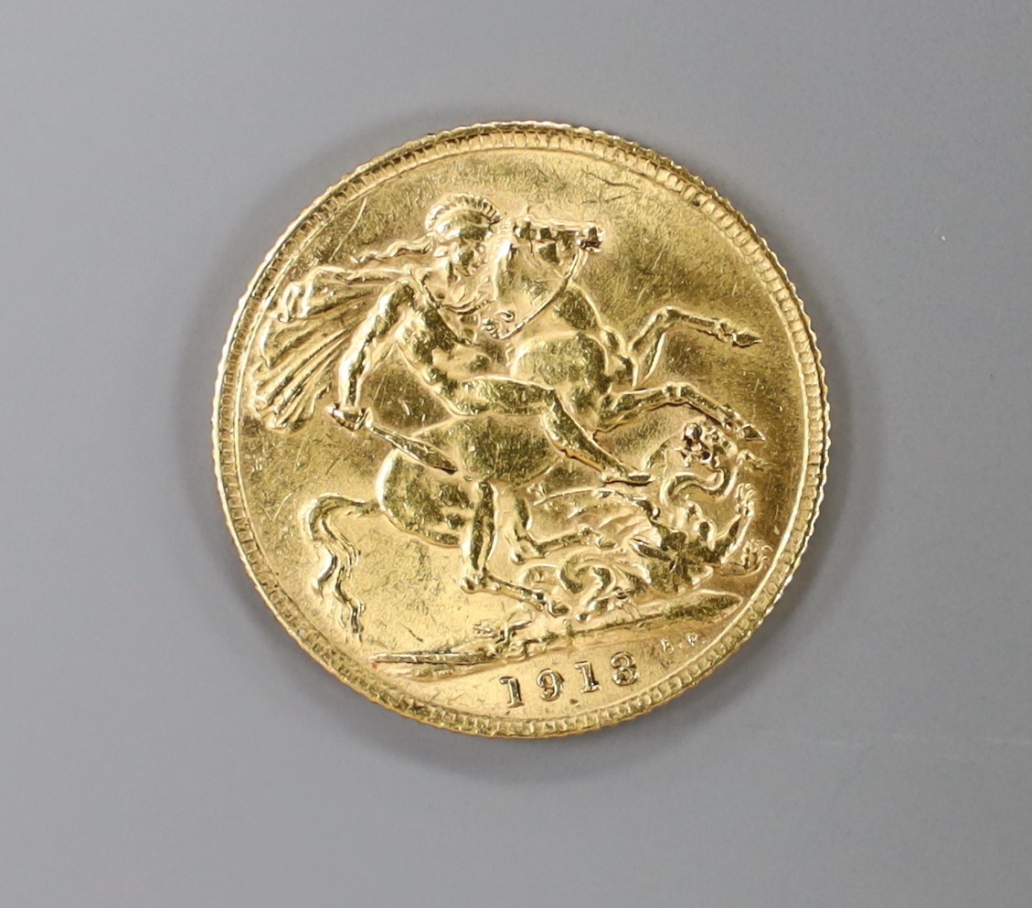A George V 1913 gold sovereign.